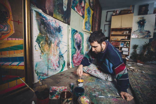 istock Amazing artist painting 875434438