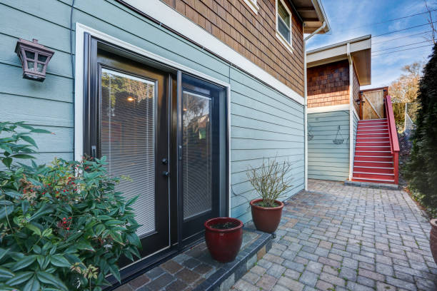 istock Backyard view of a sweet blue craftsman home 875434468