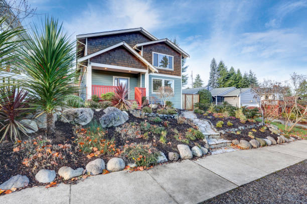 istock Nice Craftsman home exterior on blue sky background 875434622