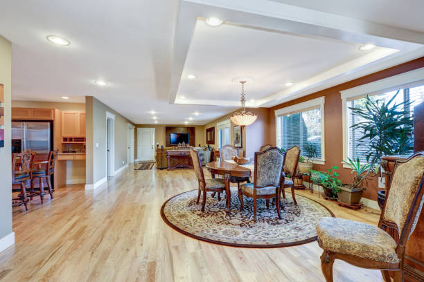 istock Craftsman home dining room interior with open floor plan 875434646
