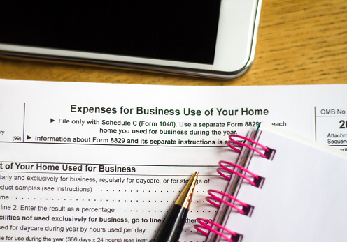 US Taxes: Home Business, Smartphone, Pen, Notebook