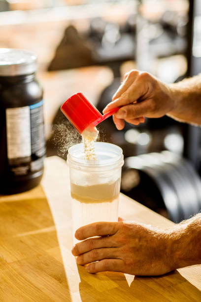 Mixing protein shake. stock photo
