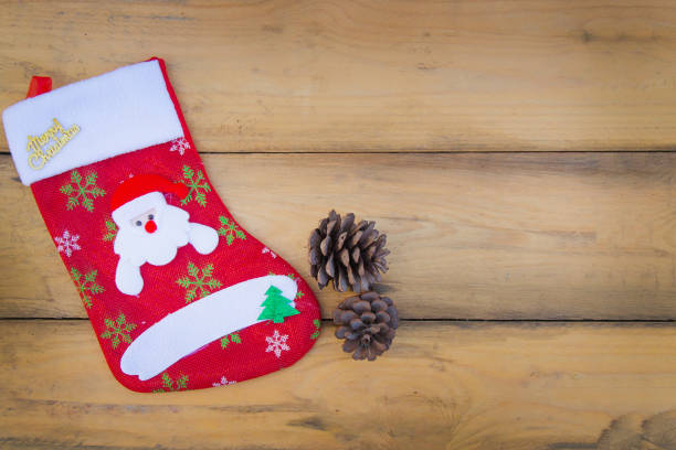 istock The sock Christmas on wood table image background 875447494