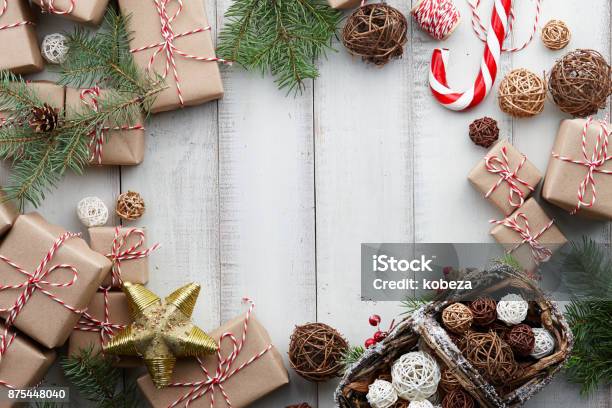 Christmas White Background With Toys Decorations And Gift Boxes Stock Photo - Download Image Now