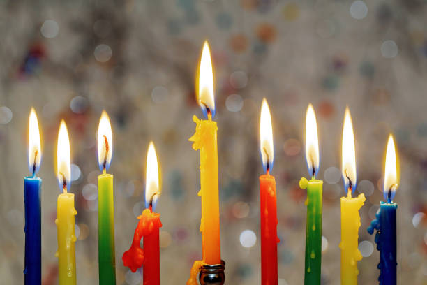 istock Hanukkah menorah with burning candles 875451462