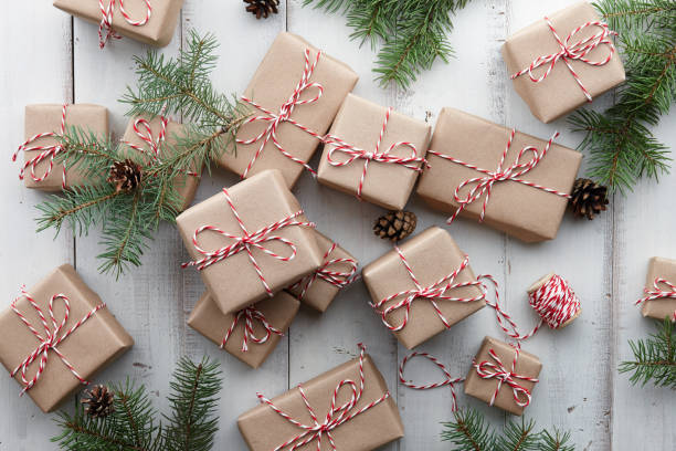 istock Christmas presents and gift boxes wrapped in kraft paper 875454210