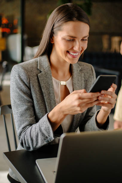 istock Young business woman in cafe bar 875454870