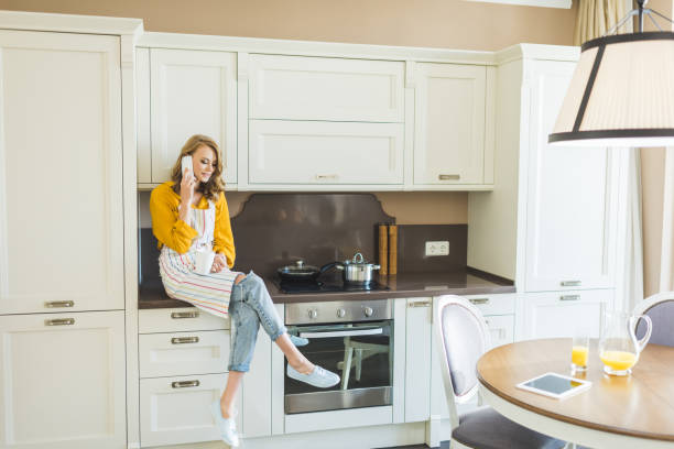 istock woman talking on phone 875457572