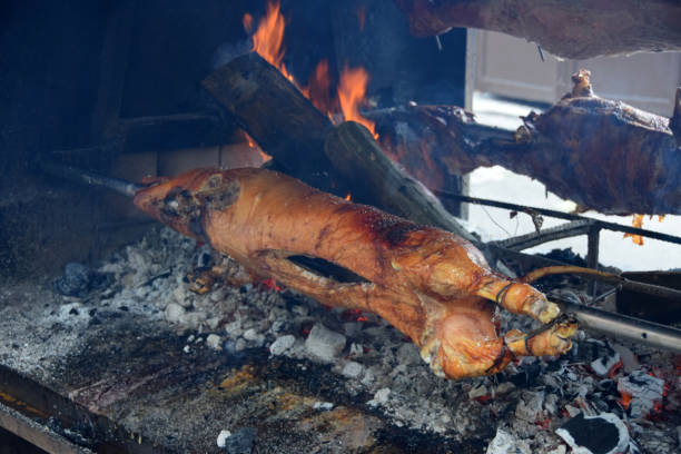 istock Almost ready roasted pork on the barbecue 875458498