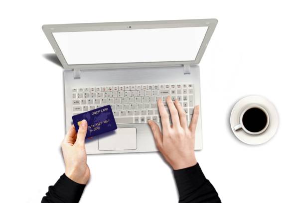 istock Online purchase using credit card and laptop 875463962