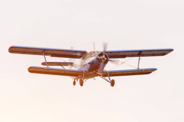 istock Old biplane, turboprop aircraft flight sky. 875471332