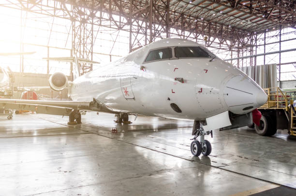 istock Passenger aircraft in the hangar on service. 875471340