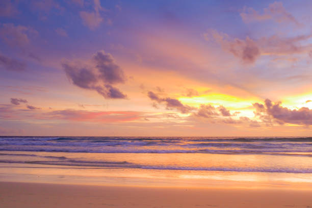 istock beautiful beach with twilight cloudy sky in the evening. 875471426