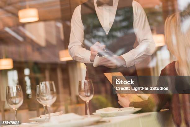 Waiter Writing Down The Order Of Customer Stock Photo - Download Image Now - Waiter, Restaurant, Menu