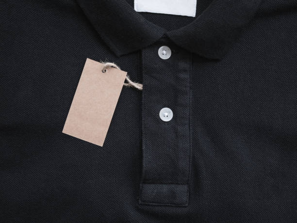 istock price tag hang over black t-shirt. 875478060