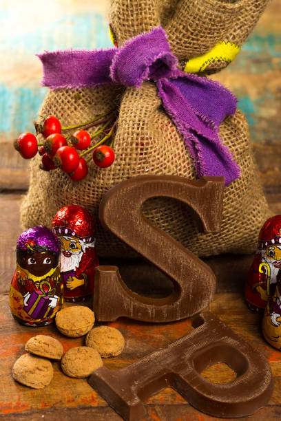 istock Traditional Dutch Saint Nicolas celebration with presents for children in December, Saint Nicolas  gift bag and chocolate letters 875480498