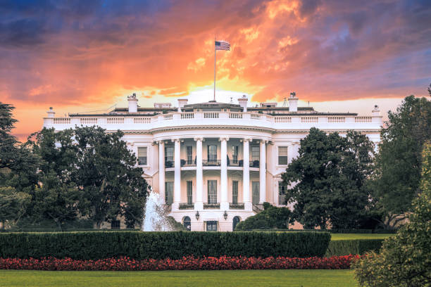 White House, under dramatic sky, sunset golden light, Washington DC White House, under dramatic sky, sunset golden light, Washington DC president photos stock pictures, royalty-free photos & images