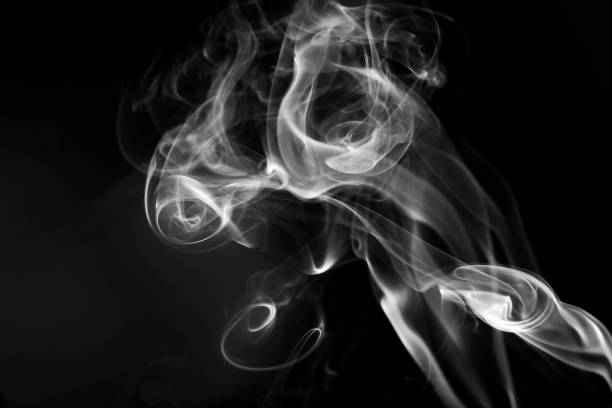 istock Abstract beautiful smoke on a black background 875490322