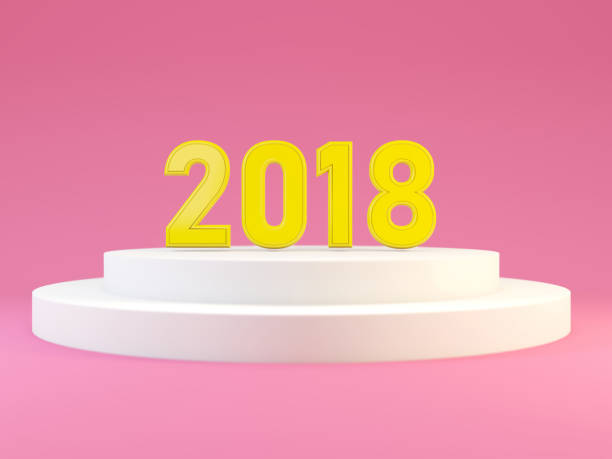 istock 2018 New year symbol on white pedestal over pink background 875496664
