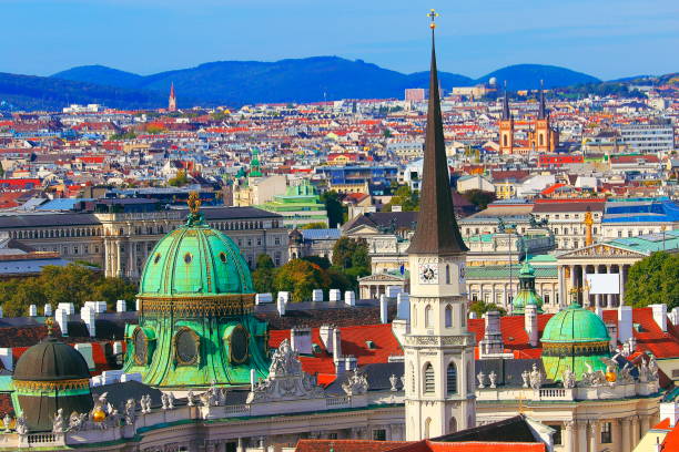 Above Vienna Cityscape, with famous international landmarks - urban skyline at sunset – Vienna , Austria Above Vienna Cityscape, with famous international landmarks - urban skyline at sunset – Vienna , Austria the hofburg complex stock pictures, royalty-free photos & images