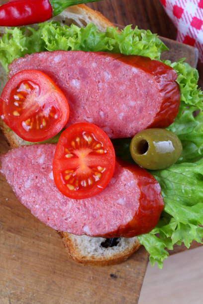 delicious Smoked sausage sandwich on table mat