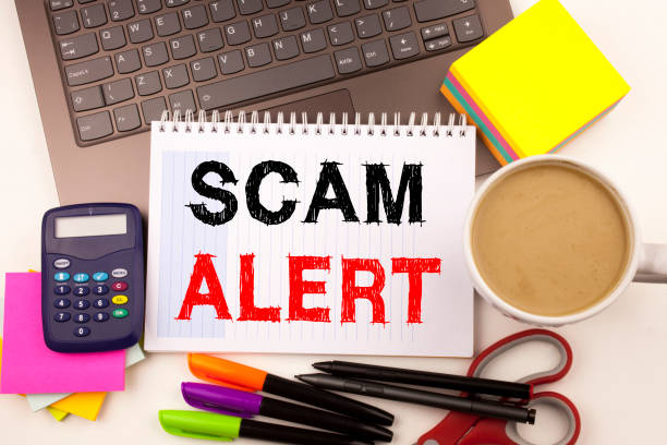 istock Scam Alert writing text made in the office close-up on laptop computer keyboard. Business concept for Scam Alert on the black background with copy space 875508486