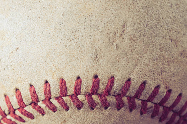 istock old Baseball on wood background with filter effect retro vintage style 875511838
