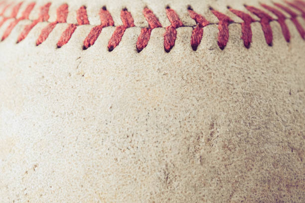 istock old Baseball on wood background with filter effect retro vintage style 875511850