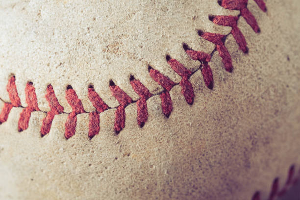 istock old Baseball on wood background with filter effect retro vintage style 875511870