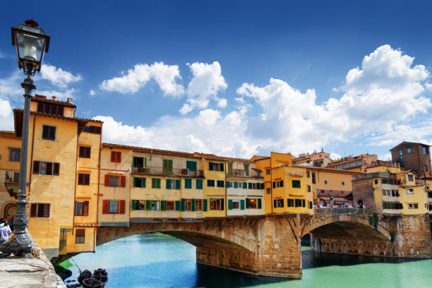 istock The Ponte Vecchio over the Arno River in Florence, Italy 875512424