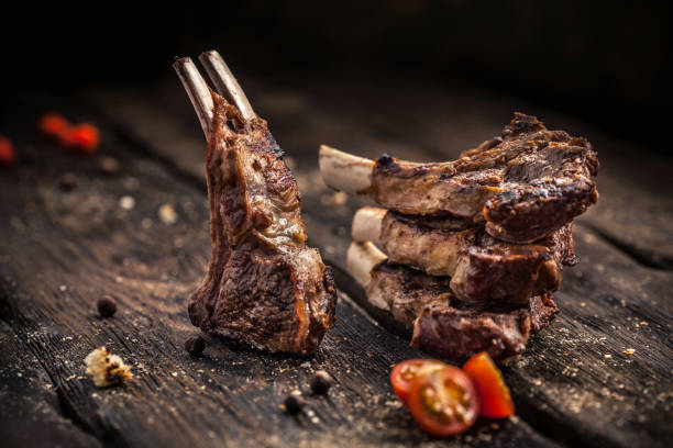 istock Grilled lamb chops on wooden table 875514958