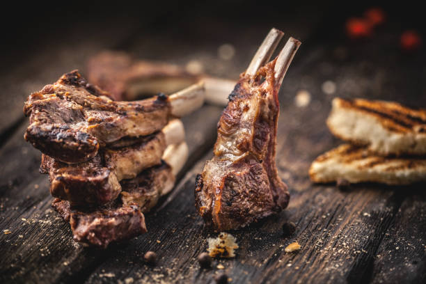 istock Grilled lamb chops on wooden table 875515058