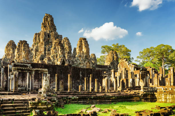 istock Stone faces of ancient Bayon temple in Angkor Thom, Cambodia 875517638