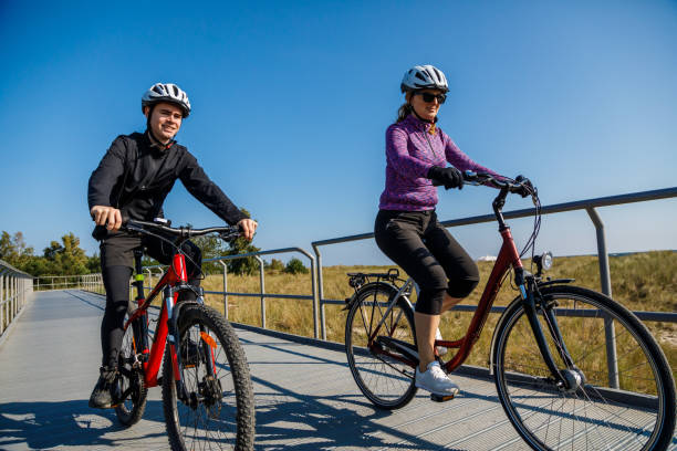 istock Healthy lifestyle - people riding bicycles 875517702