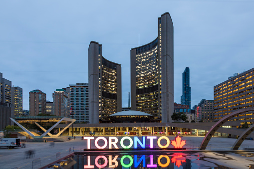 Toronto, Canada - Oct 12, 2017: Colorful illuminated Toronto sign at the Nathan Phillips Square in Toronto, Canada