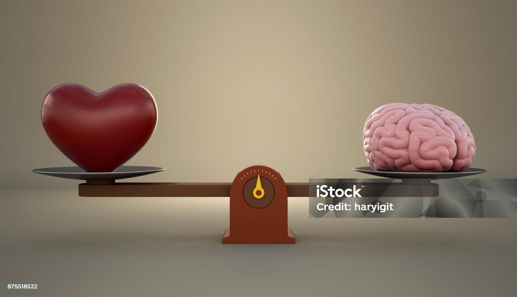 Brain and heart on a wooden balance scale. Emotion Stock Photo