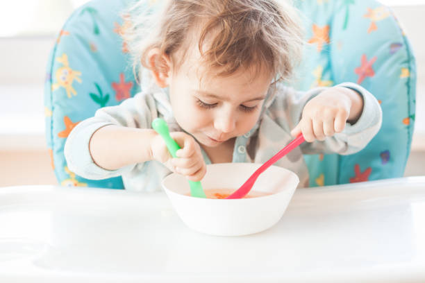 istock The girl is eating very fast 875525296