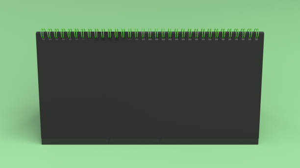 istock Black table calendar mock-up on green surface 875527796