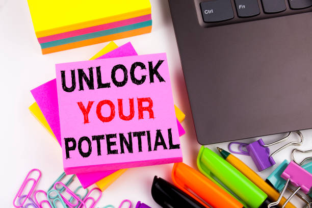 istock Writing text showing Unlock Your Potential made in the office with surroundings such as laptop, marker, pen. Business concept for Self-Development Improvement white background with copy space 875530656