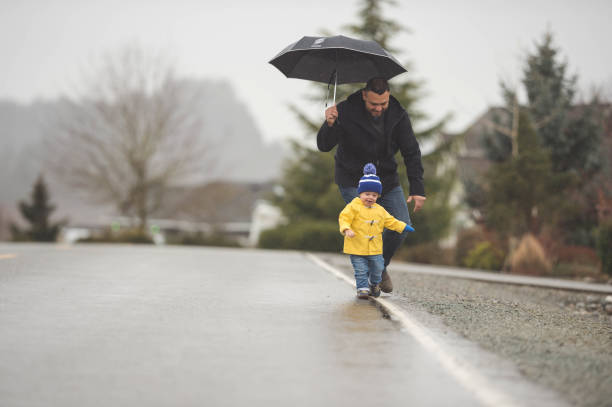 istock Family Walk in the Rain 875534100