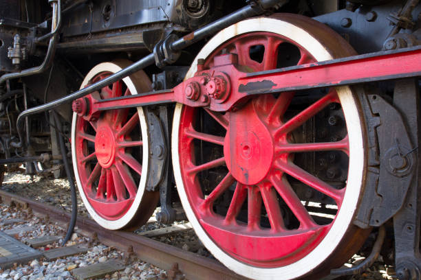 istock Steam locomotive wheels close up 875537686