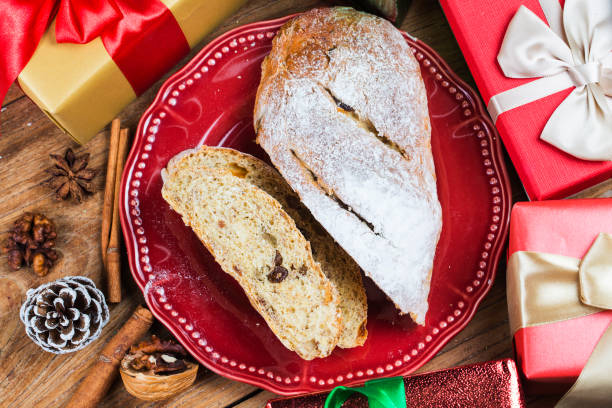 istock Christmas background with decorations and gift boxes on wooden boardBread 875540350