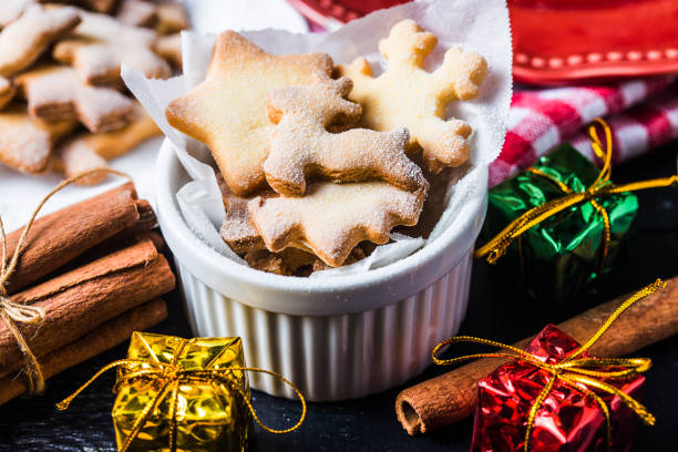 istock Christmas cookies background. Ginger dough for gingerbread, star, Christmas tree, 875540802