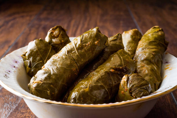 istock Turkish Food Dolma Stuffed Grape Leaves with Minced Meat, Rice and Tomato Paste / Sarma 875550974