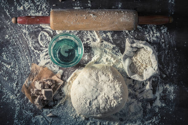 istock Preparation for baking tasty and homemade dough for pizza 875555078