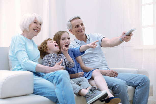 istock Emotional relatives sitting and laughing 875557486
