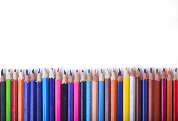istock Crayons - colored pencil set loosely arranged  on white background. 875557600