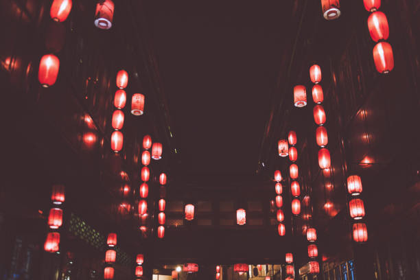 istock Large group of red lanterns at night 875558112