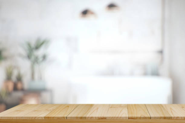 istock Wood top table with white blurred bathroom interior Background. for product display montage. 875558432