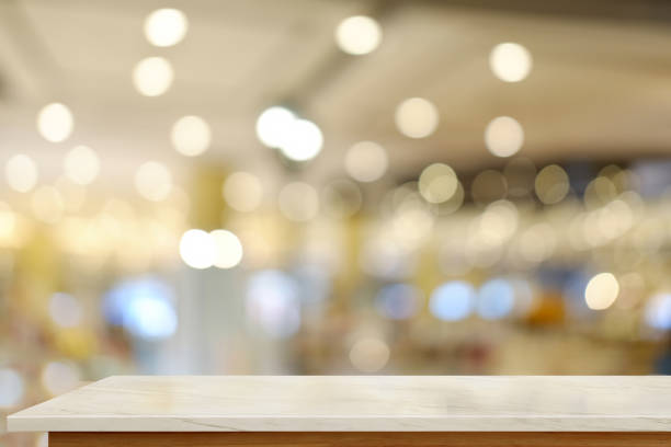 istock Top marble table over abstract light bokeh background. for product display montage. 875560636